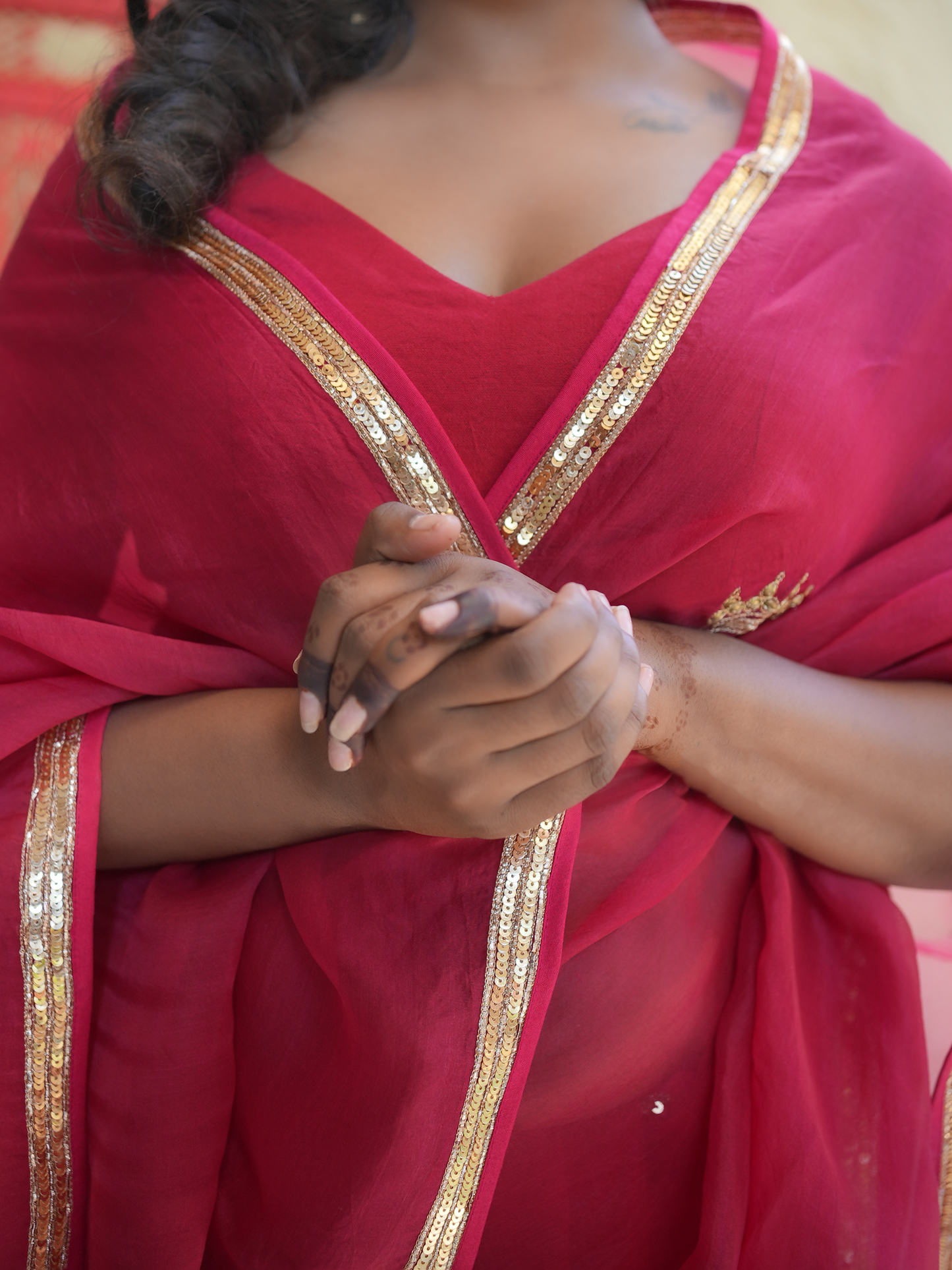 Rani Pink Organza Saree with Gold Zari Border & Embroidered Buttas