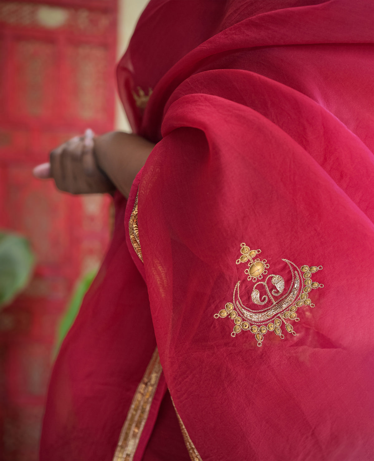Rani Pink Organza Saree with Gold Zari Border & Embroidered Buttas