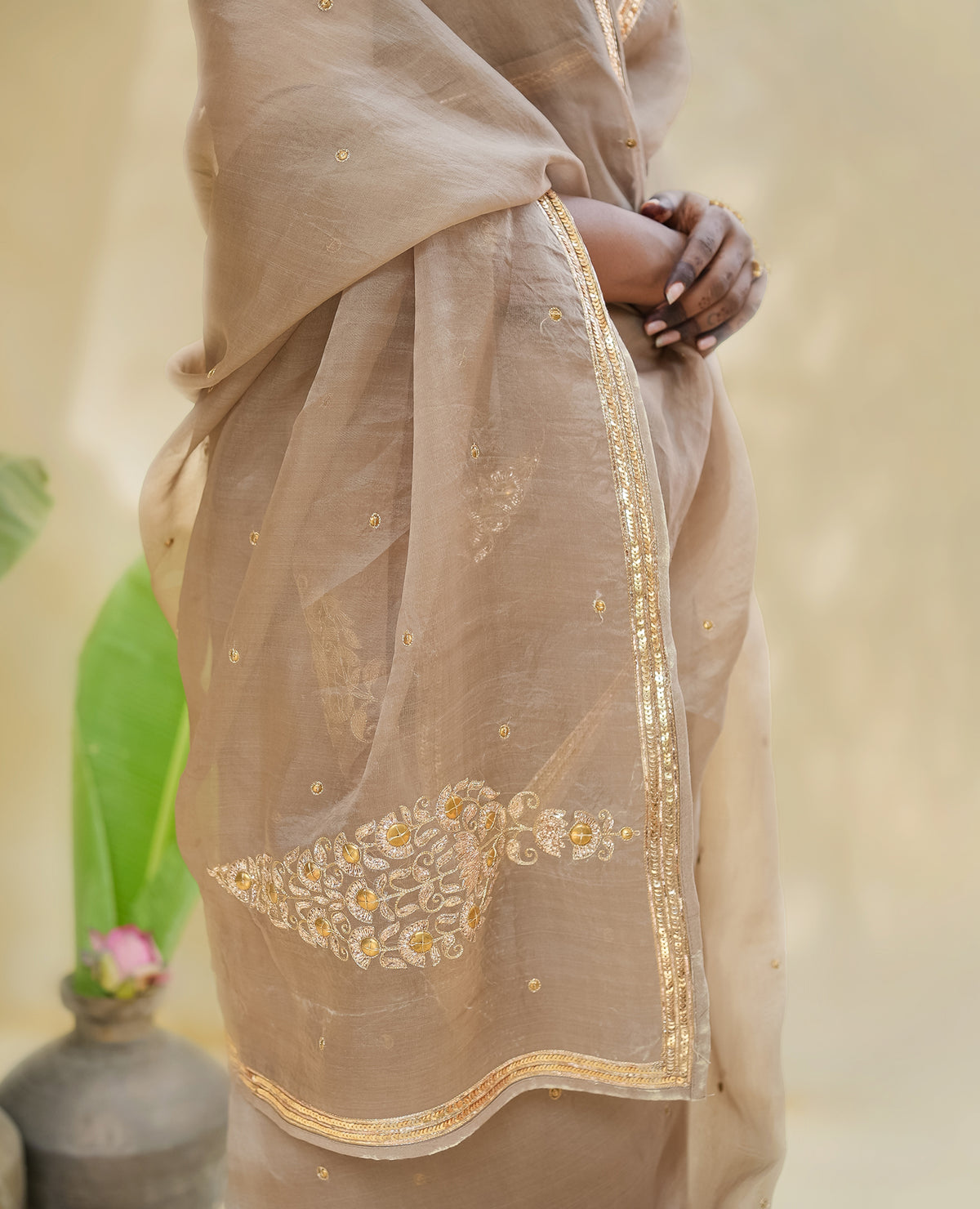 Champagne Gold Organza Saree with Zari Border & Sequin Buttas