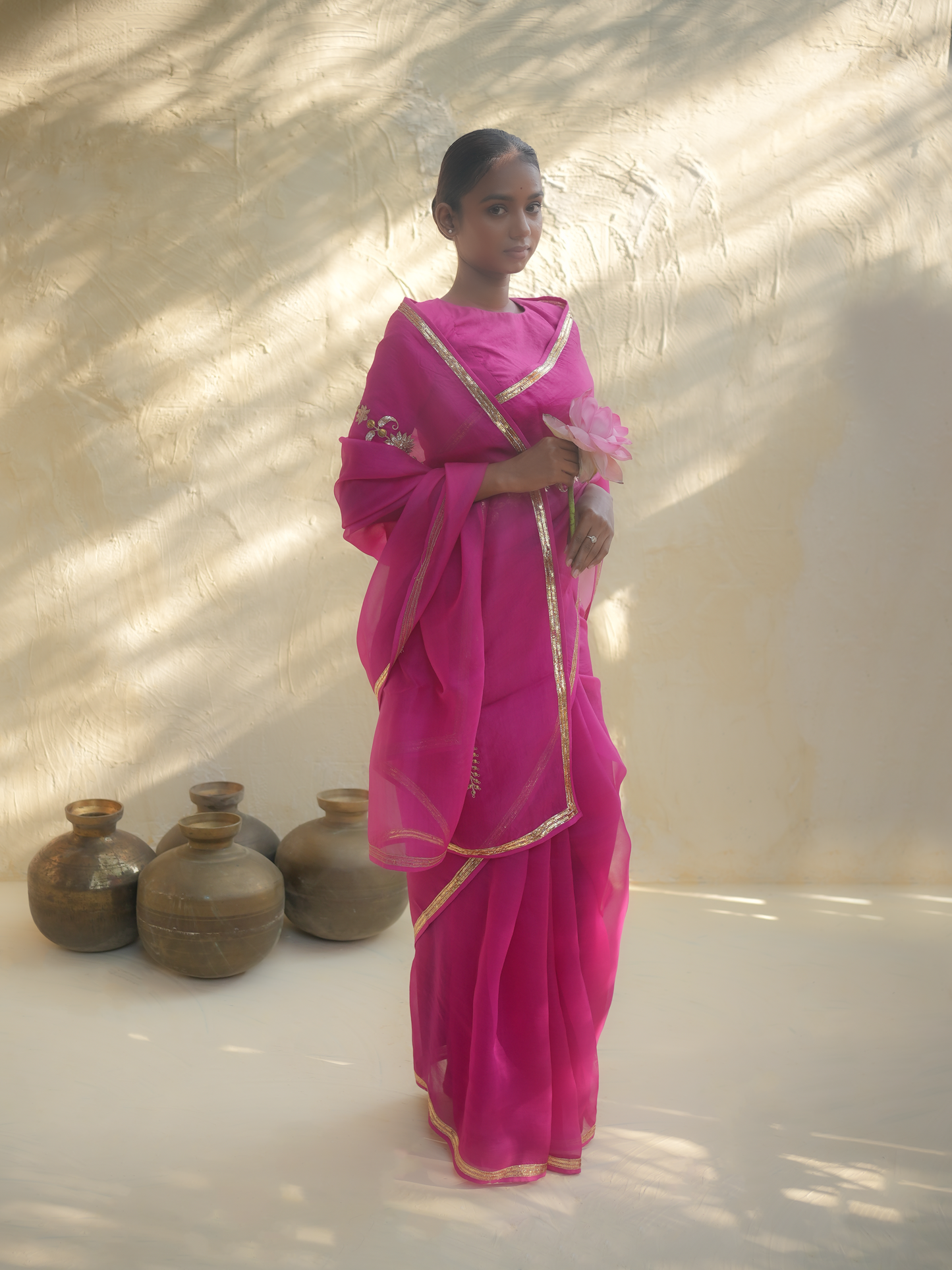 Hot Pink Organza Saree with Gold Zari Border & Embroidered Motifs