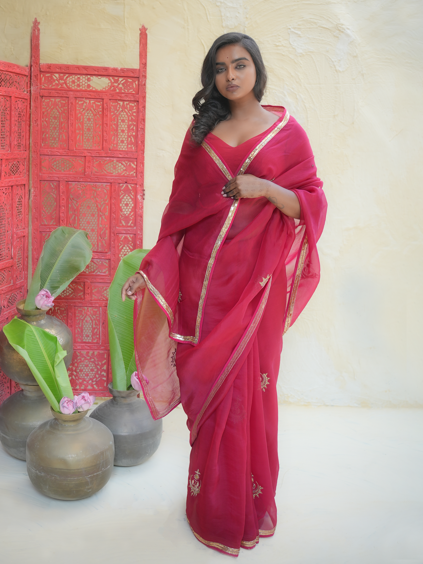 Rani Pink Organza Saree with Gold Zari Border & Embroidered Buttas