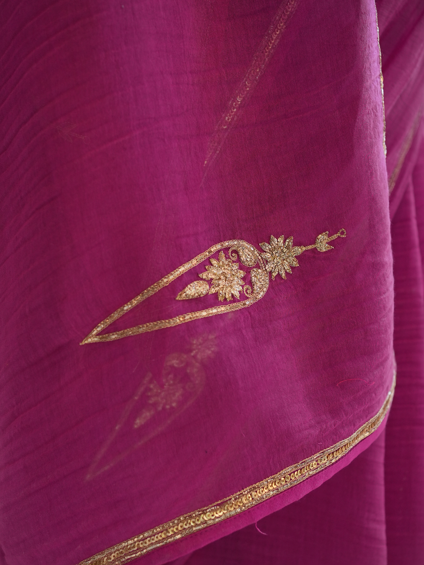 Rani Pink Textured Organza Saree with Gold Zari Border