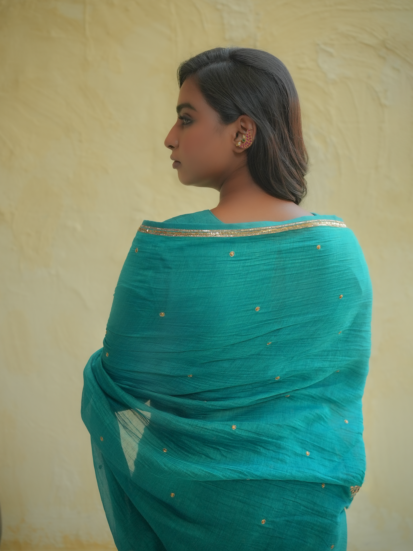 Teal Blue Organza Saree with Gold Zari Border & Embroidered Buttas