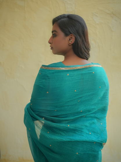 Teal Blue Organza Saree with Gold Zari Border & Embroidered Buttas