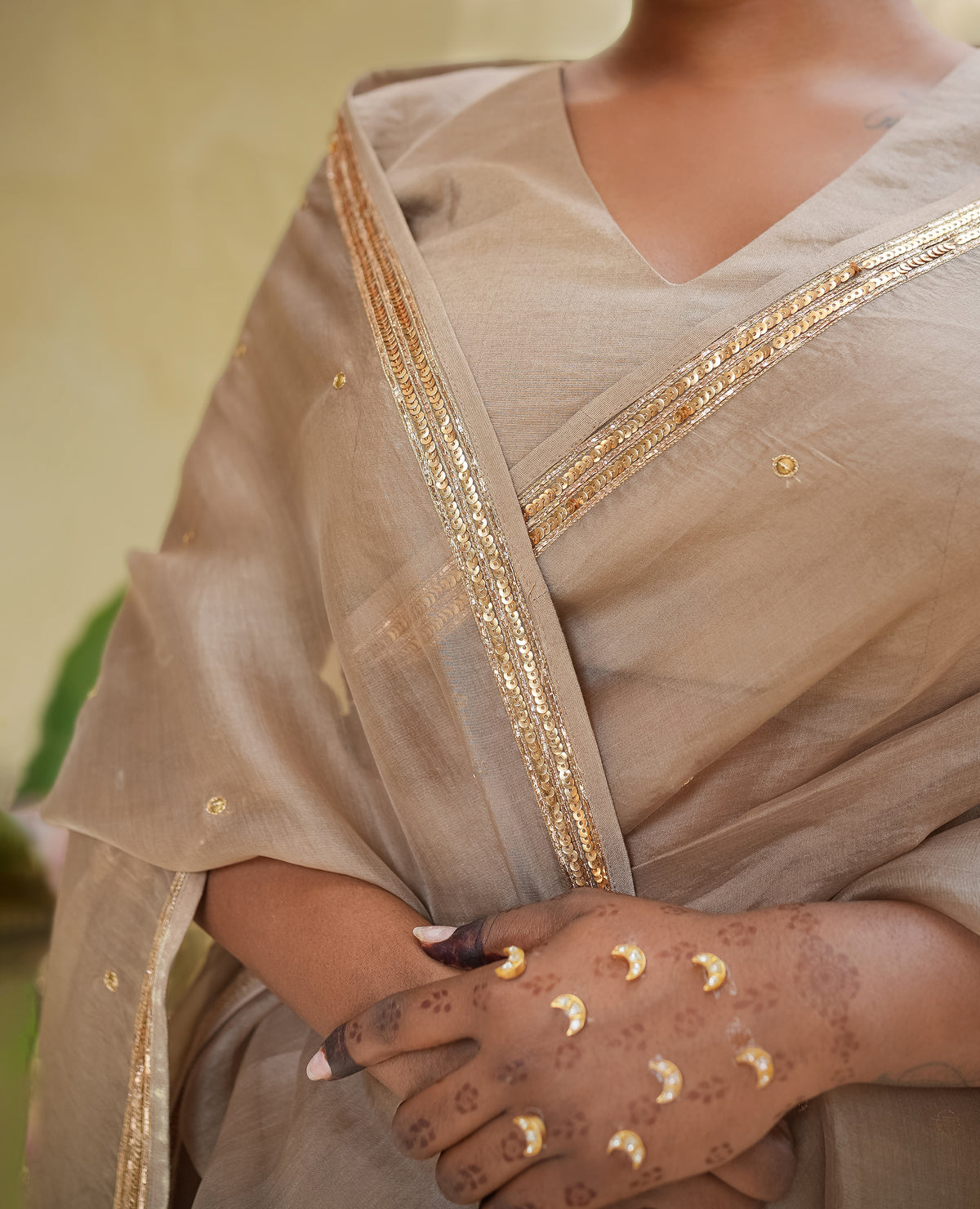 Champagne Gold Organza Saree with Zari Border & Sequin Buttas